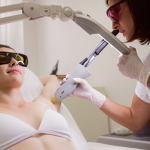 doctor-performing-laser-hair-removal-on-patient-skin